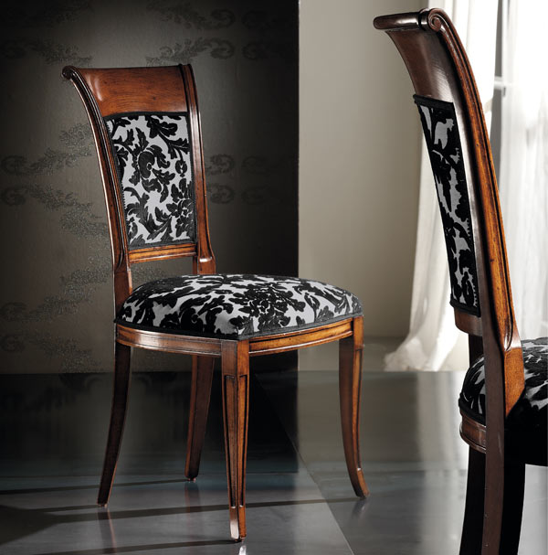 Comfortable classic style chair Comfortable classic style chair with beech wood structure; upholstered in elegant fabric. Dark Bassano finishing.