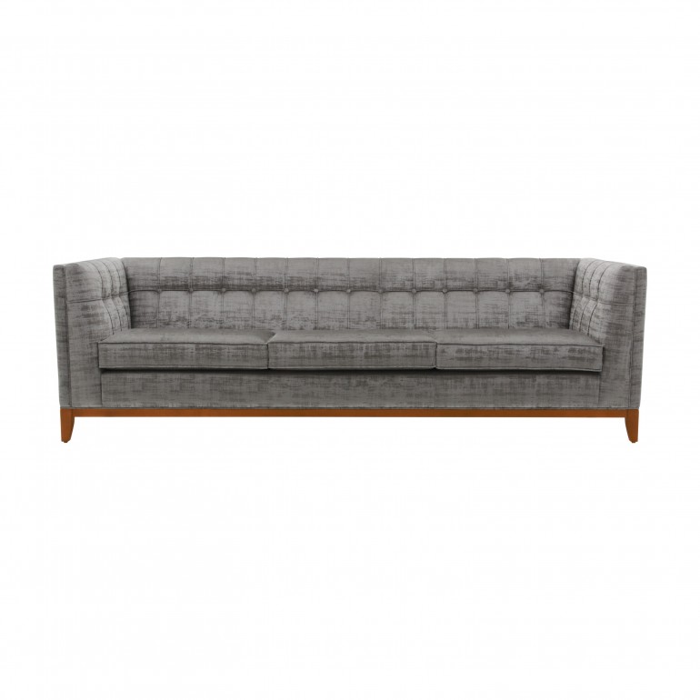 Large contemporary sofa with buttoned back, upholstered in silver/grey velvet with cherry wood base