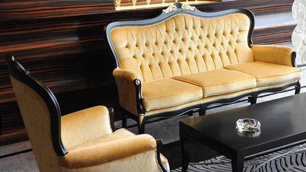 Foglia armchairs and sofa in a gold color velvet at the Imperial Seal restaurant in Shanghai